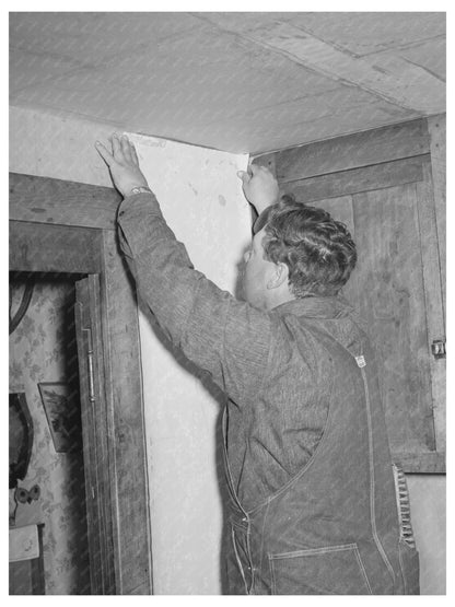 George Hutton Jr. Papering Kitchen Pie Town New Mexico 1940