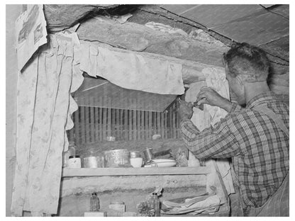 Jack Whinery Repairs Window in Dugout June 1940