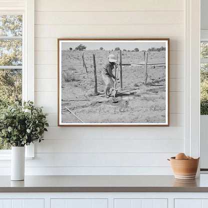 Mrs. Hutton Irrigating Garden in Pie Town New Mexico 1940