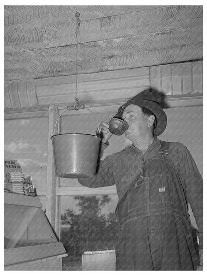 Farmer Drinking from Bucket in Pie Town New Mexico 1940