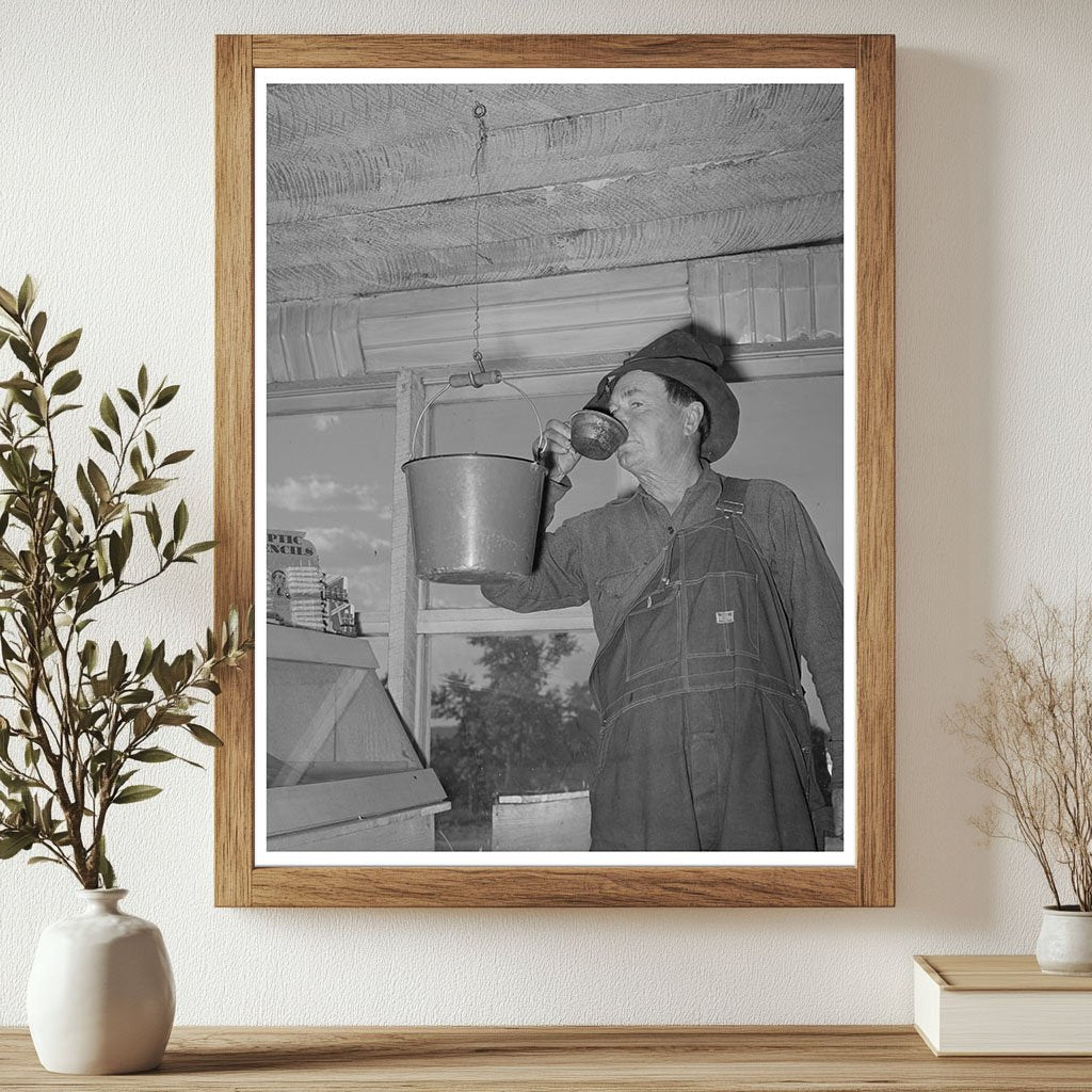 Farmer Drinking from Bucket in Pie Town New Mexico 1940