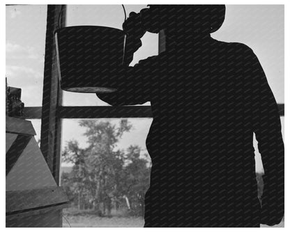 Farmer Drinking Water in Pie Town New Mexico June 1940