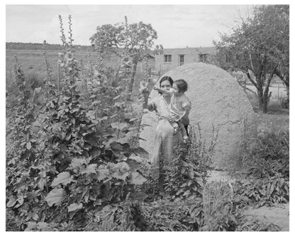 Spanish-American Woman and Baby in Flower Garden 1940