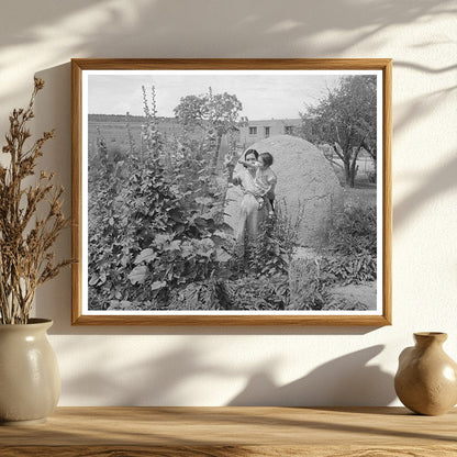 Spanish-American Woman and Baby in Flower Garden 1940