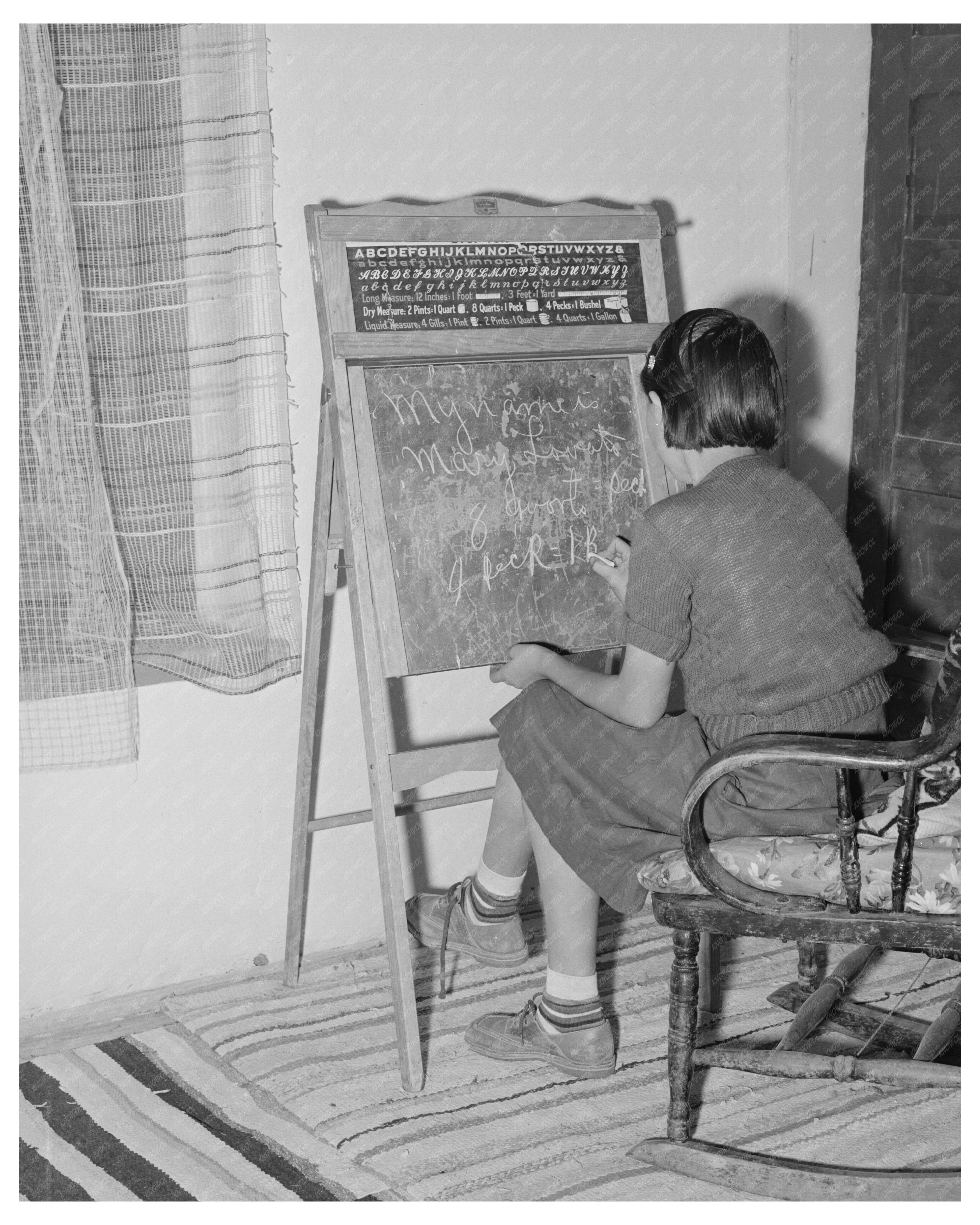Spanish-American Girl Learning English in Chamisal 1940