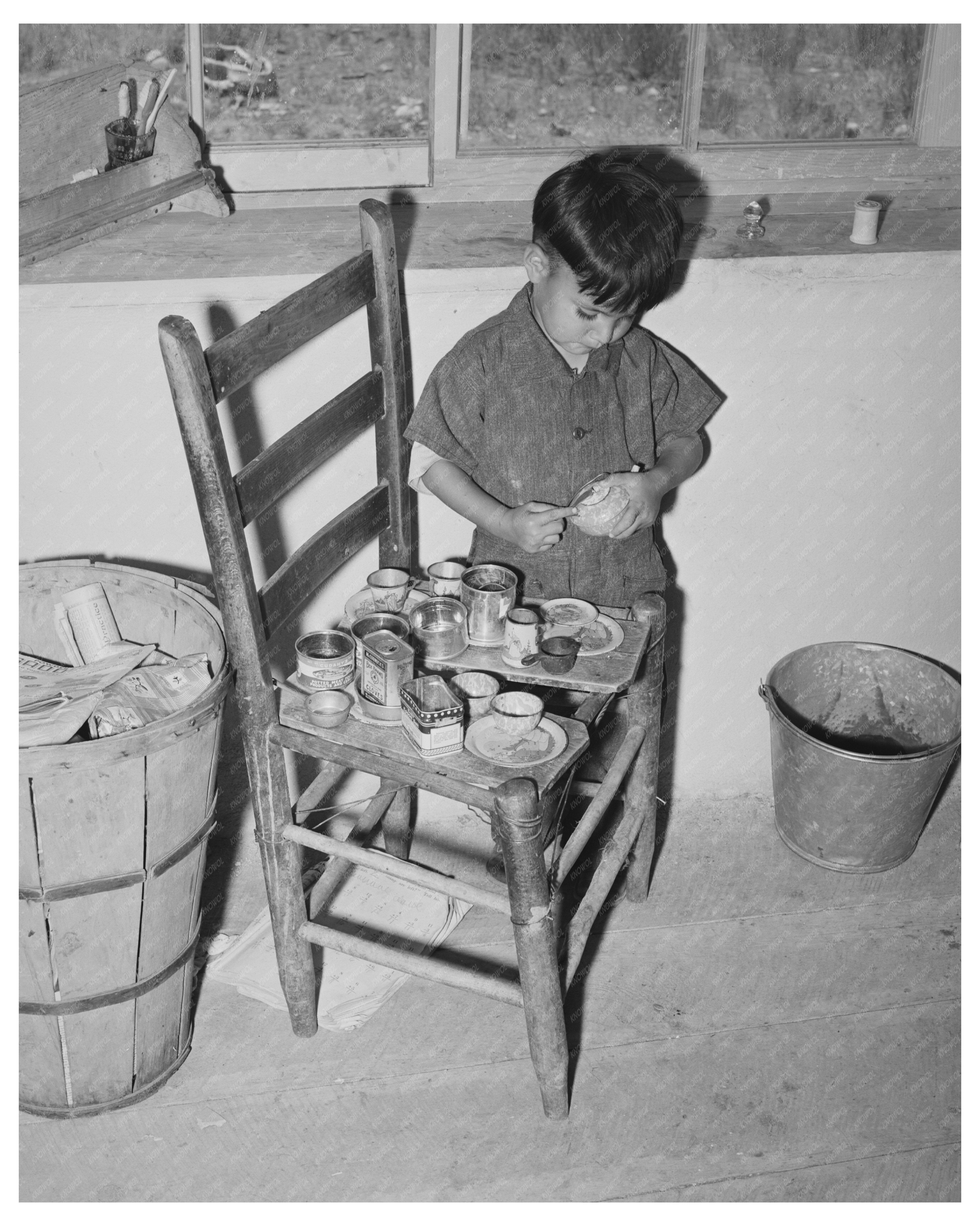 Spanish-American Boy Playing in Amalia New Mexico 1940