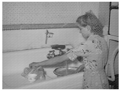 Girl Washing Dishes in Snowville Utah August 1940