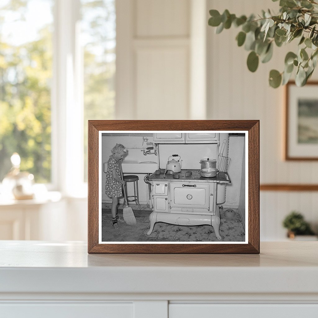 Young Girl Sweeping Kitchen in Snowville Utah 1940