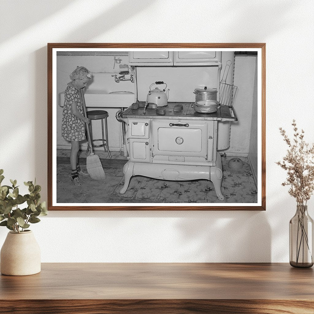 Young Girl Sweeping Kitchen in Snowville Utah 1940