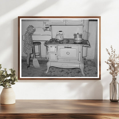 Young Girl Sweeping Kitchen in Snowville Utah 1940