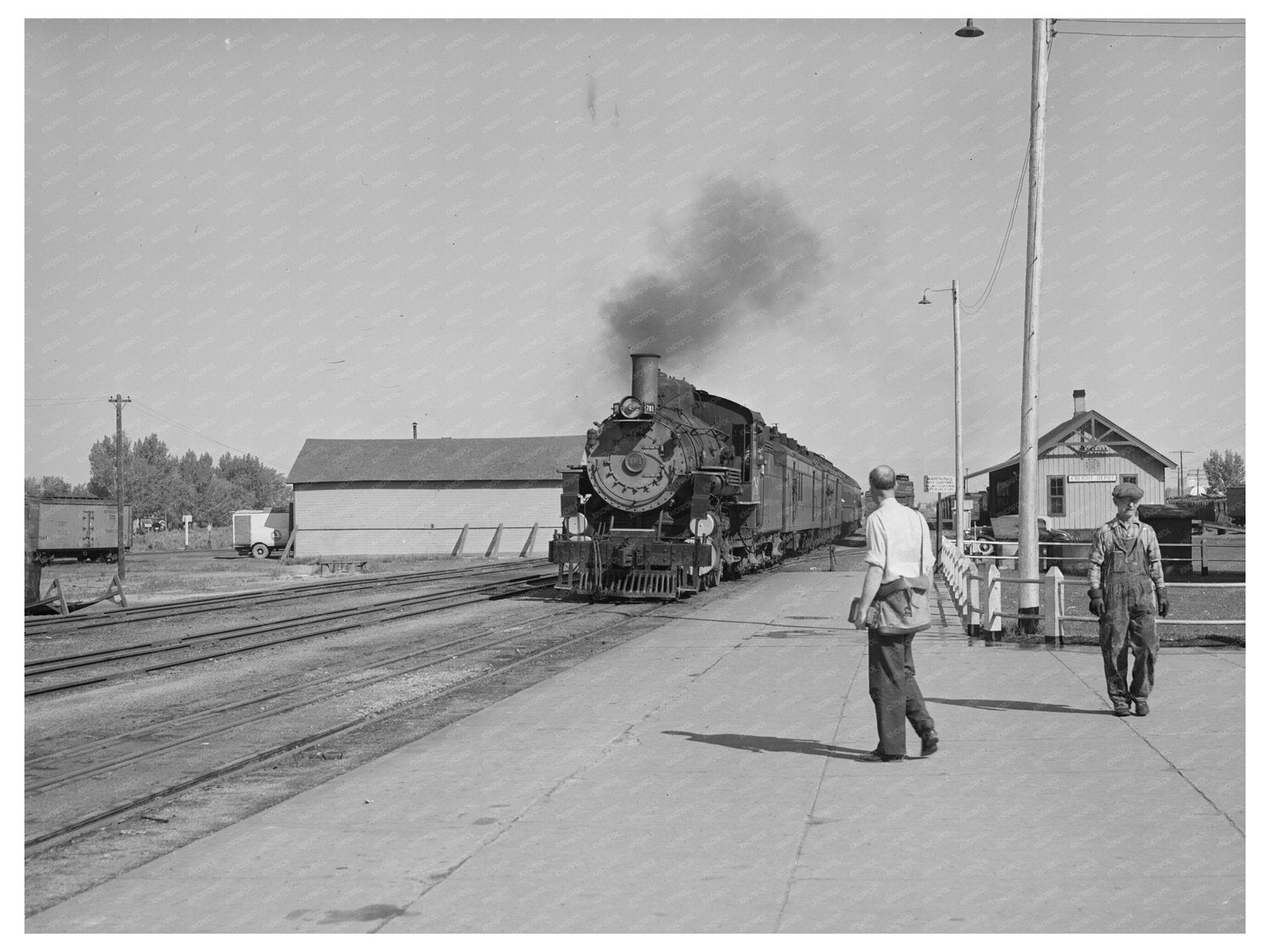Morning Train Arriving in Montrose Colorado 1940