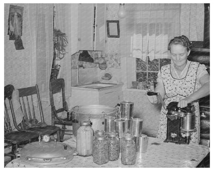 Mrs. Christiansen Sealing Cans Box Elder County 1940