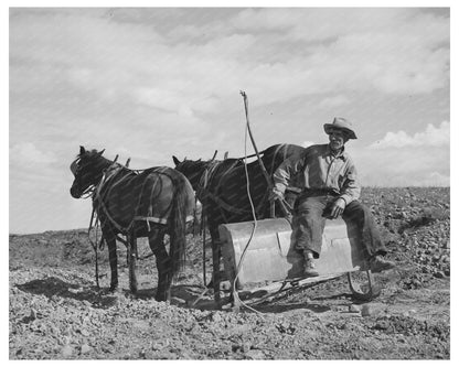 Worker on Stoop in Concho Arizona September 1940