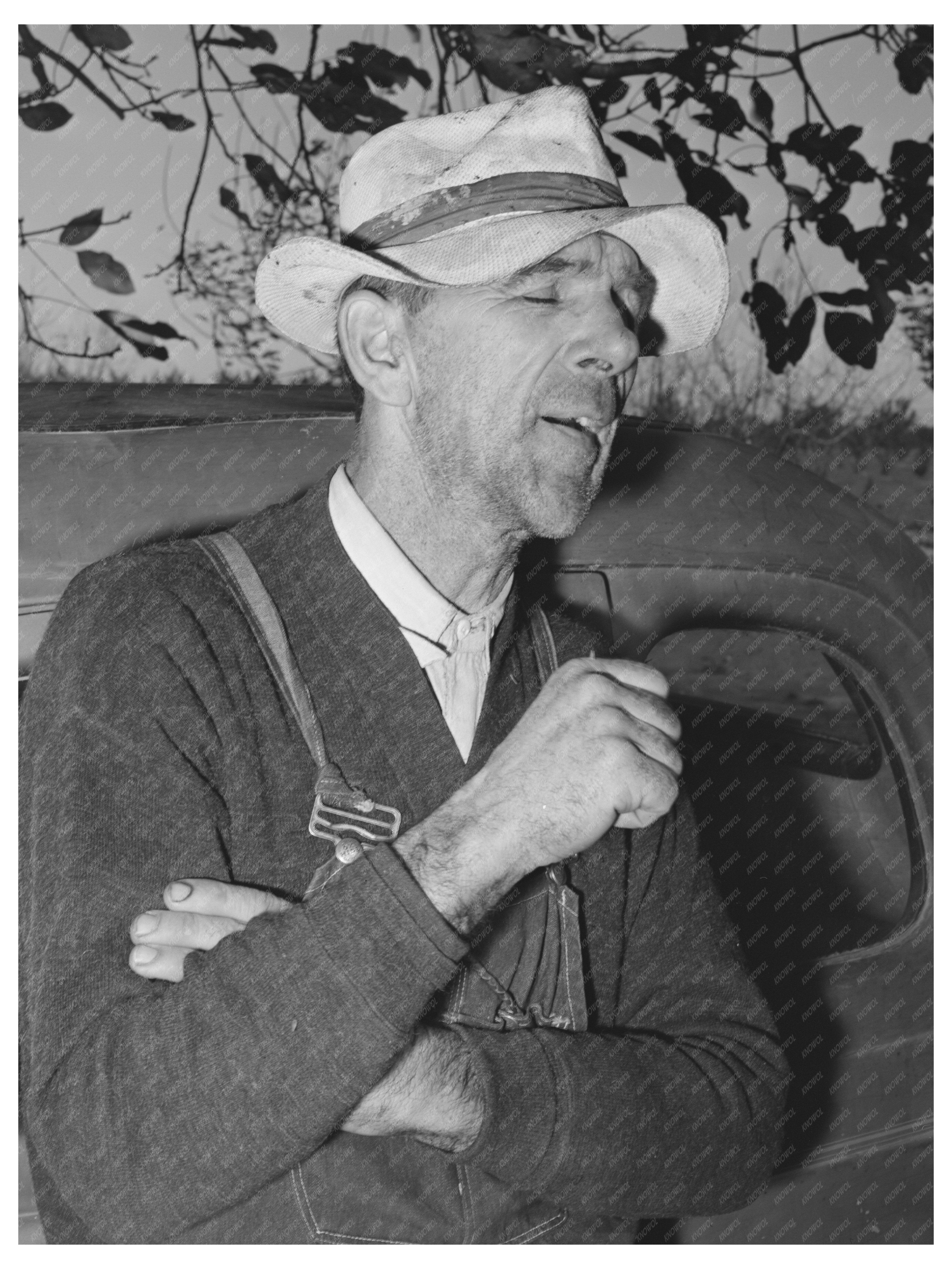 Paul Erickson on Tractor at Fruit Farm Yuba County 1940