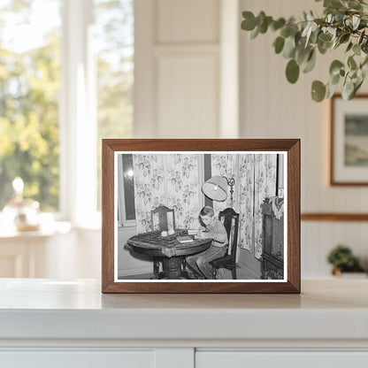 Son of Mr. Schmidt Doing Homework Tulare County 1940