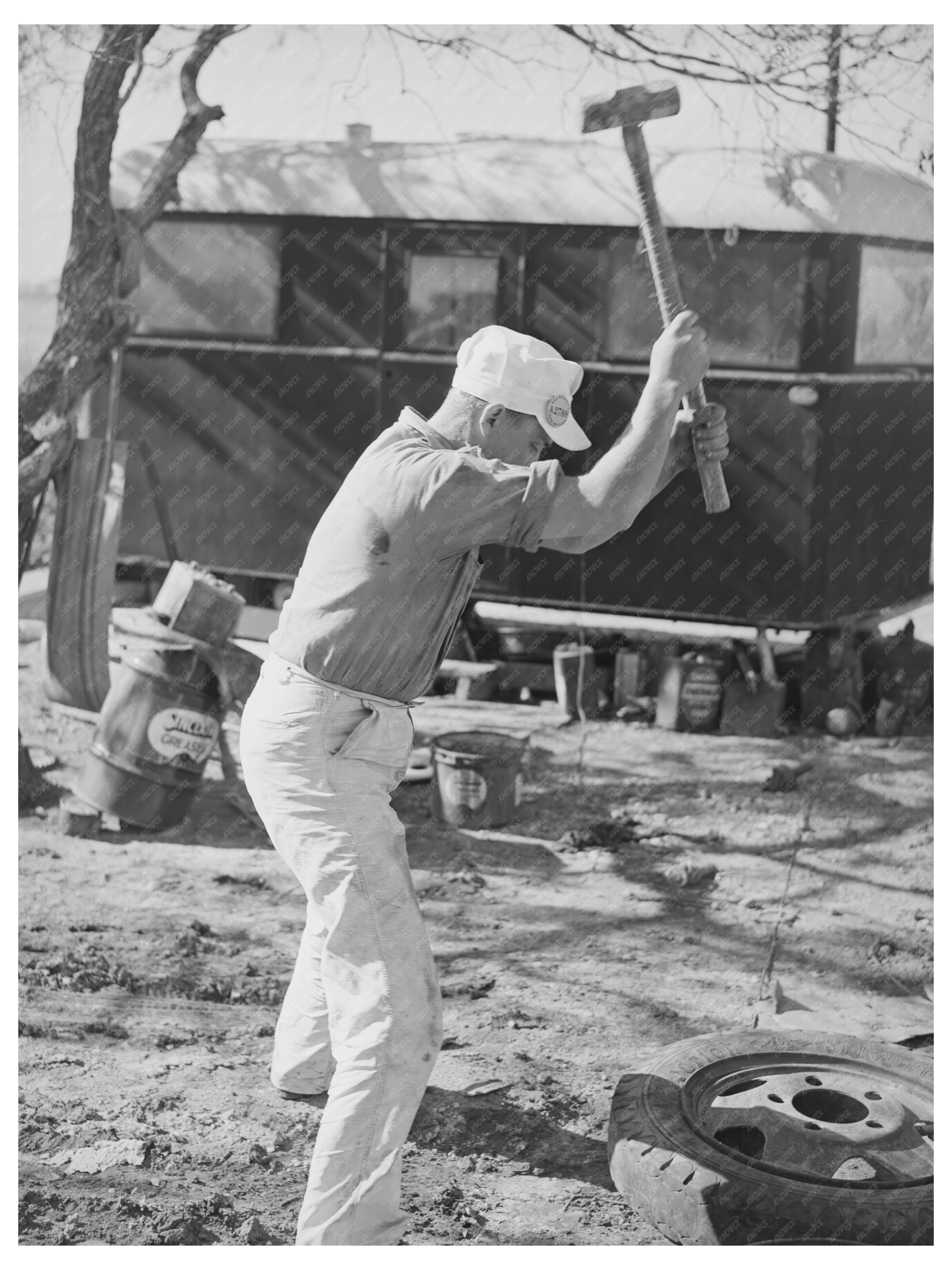 Truck Driver Repairs Tire in Corpus Christi Texas 1940
