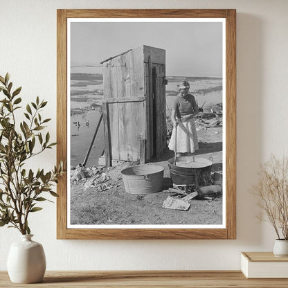 Daughter of Roofer Washing Clothes in Texas 1940