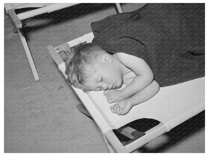 Boy Sleeping in Yuba City Farm Workers Camp 1940