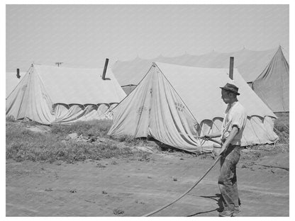 Farm Worker Watering Dusty Ground in Wilder Idaho 1941
