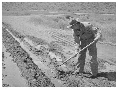 Farmer Tending Garden in Malheur County Oregon 1941