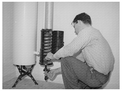 1941 Young Man Lighting Hot Water Heater in San Diego