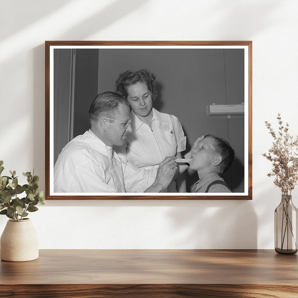 Doctor and nurse attend farm workers son Caldwell Idaho 1941