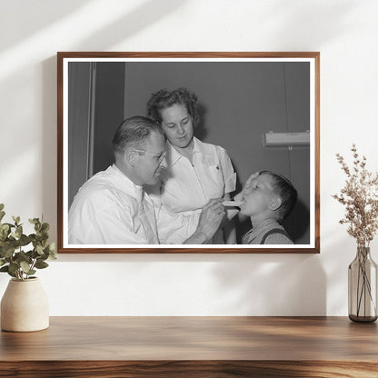 Doctor and nurse attend farm workers son Caldwell Idaho 1941