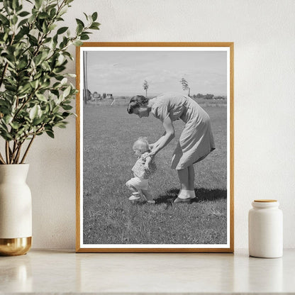 Farm Workers Wife Teaches Daughter to Walk 1941