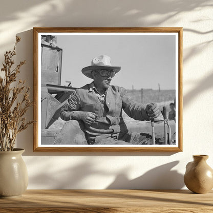 Driver on Caterpillar Tractor Pulling Combine July 1941