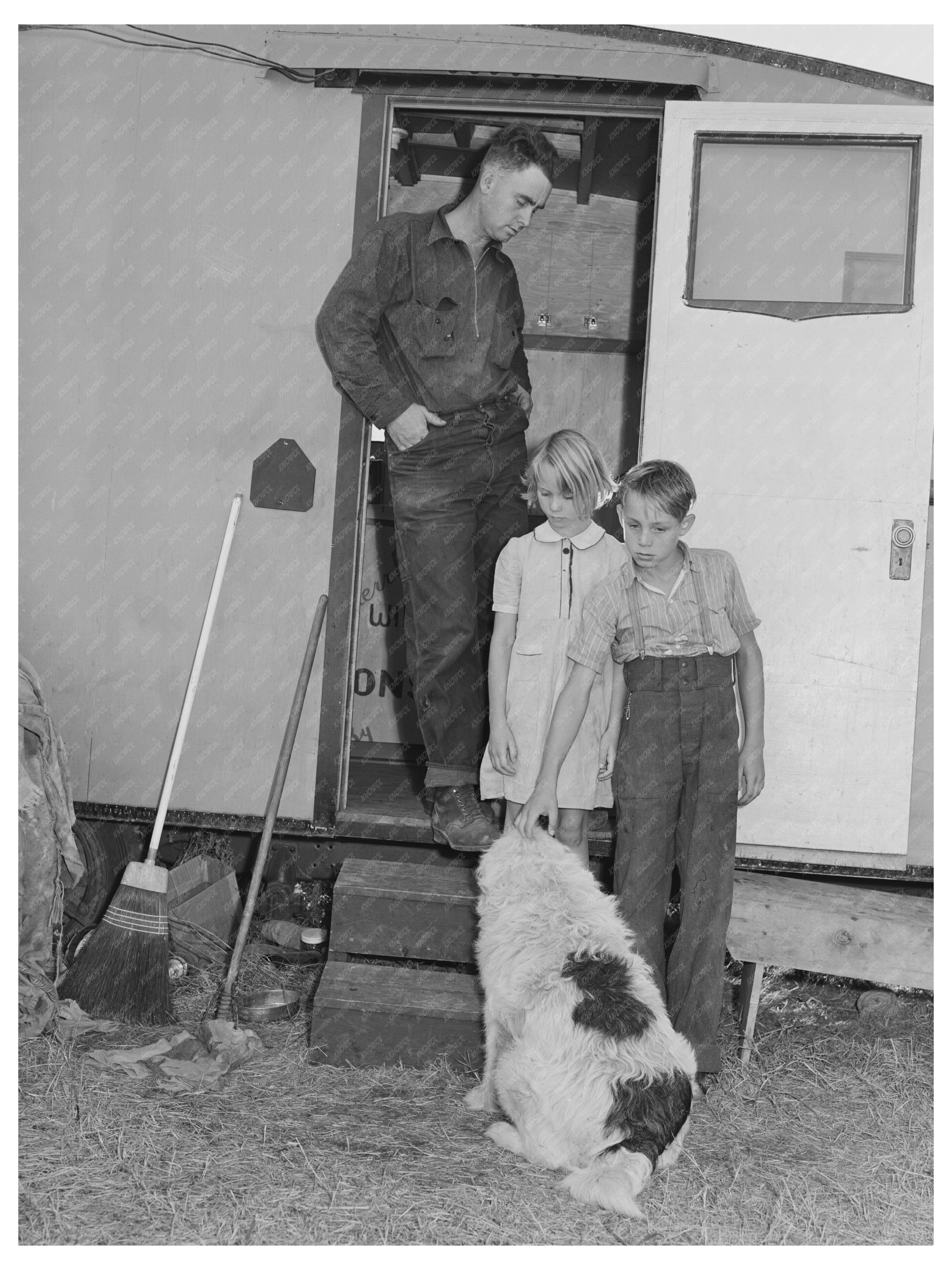 Workman and Children by Homemade Trailer 1941