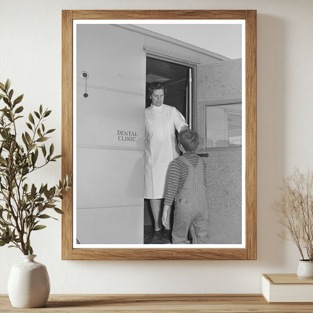 Nurse Welcomes Migrant Boy to Dental Trailer 1941