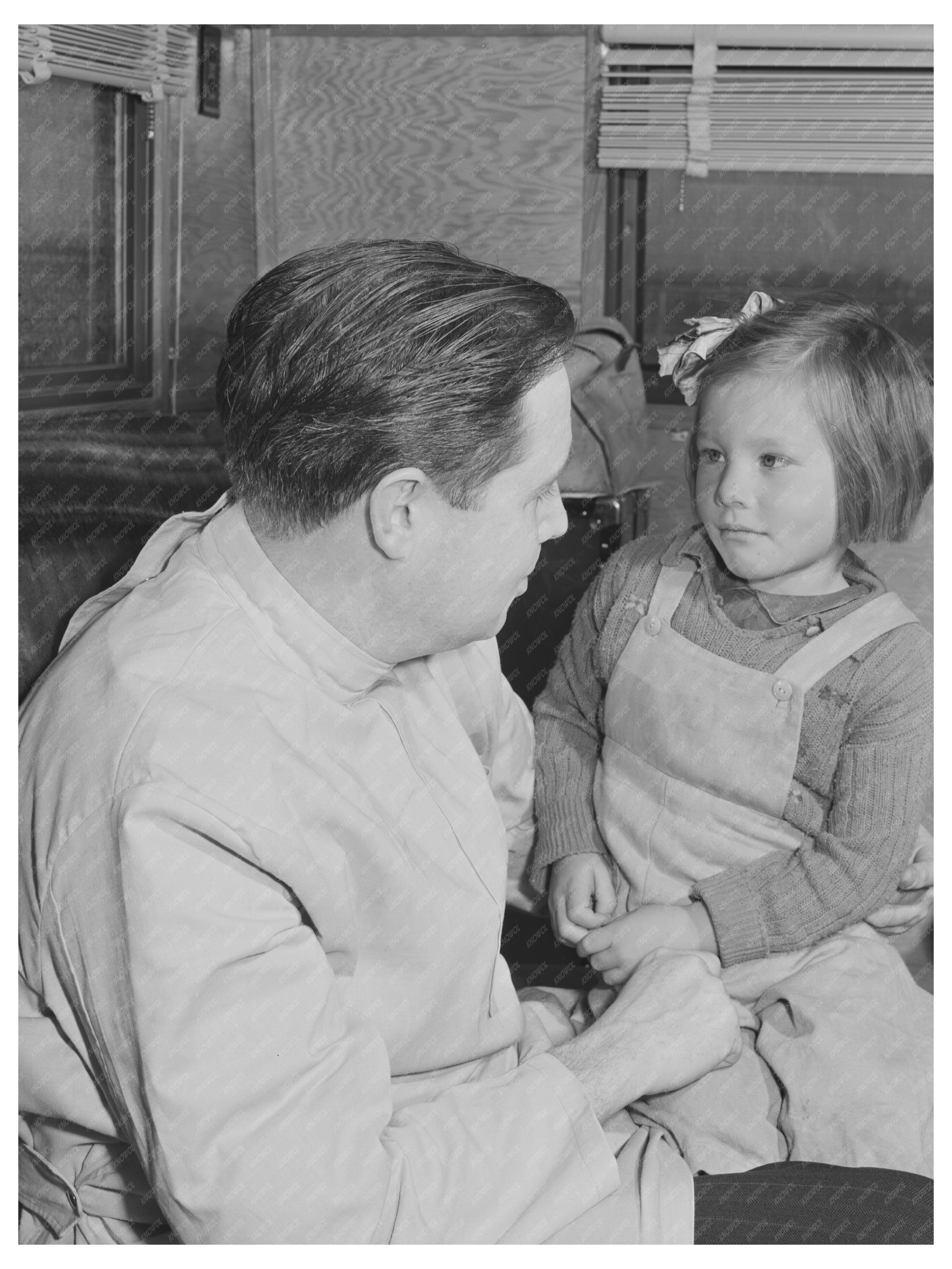 Dentist Treating Migrant Child in Idaho 1941