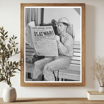 Workman at Shasta Dam Reads War Extra Newspaper 1941