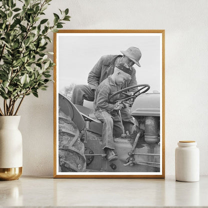 Farmer Teaching Son to Drive Tractor Tulare County 1942