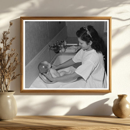 Girl Learning to Bathe Infant in Arizona 1942