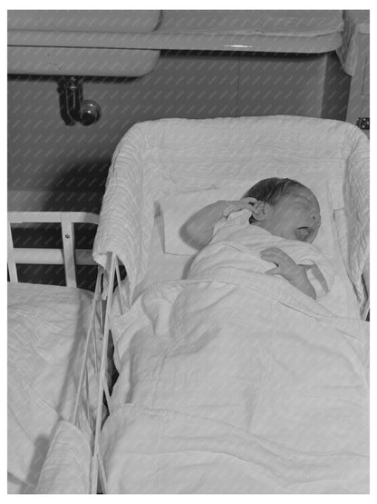 Baby in nursery at Cairns General Hospital February 1942