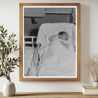 Baby in nursery at Cairns General Hospital February 1942