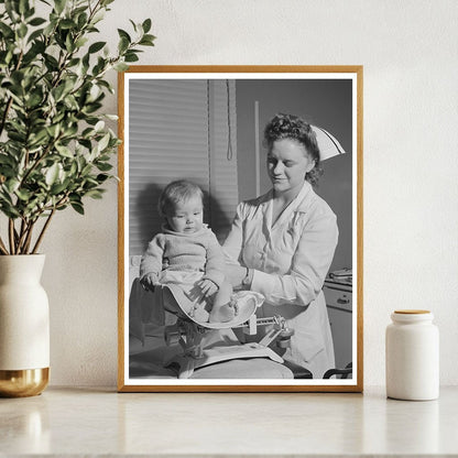 Nurse Weighing Baby at Cairns General Hospital 1942