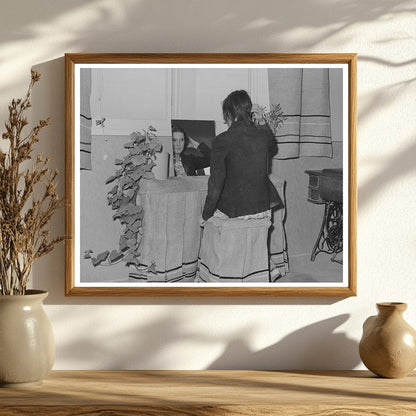 Schoolgirl at Dressing Table in FSA Community February 1942