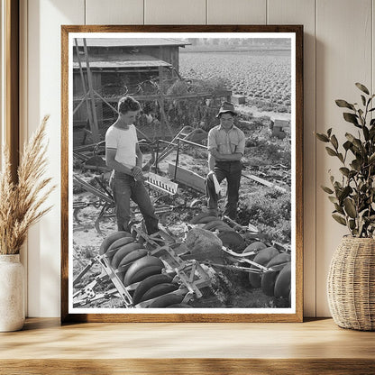 1942 Farmer Examines Equipment Amid Japanese Evacuation