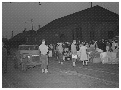 Japanese-Americans Waiting for Train in April 1942