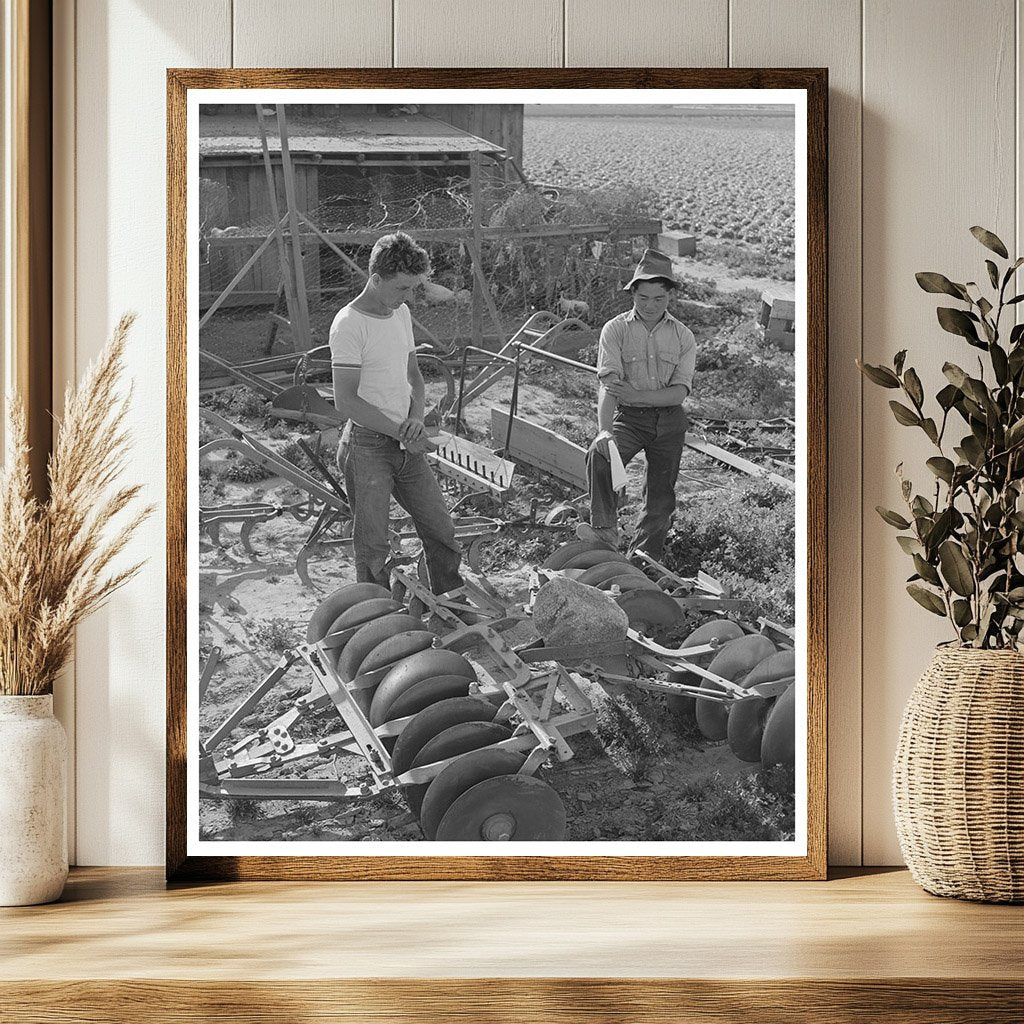 Farmer Examines Equipment Los Angeles County 1942
