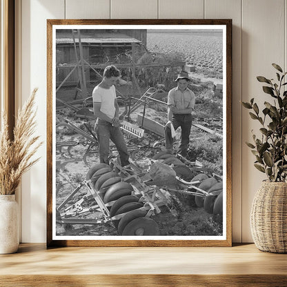 Farmer Examines Equipment Los Angeles County 1942