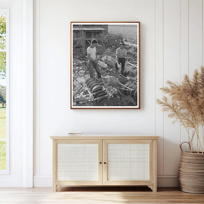 Farmer Examines Equipment Los Angeles County 1942