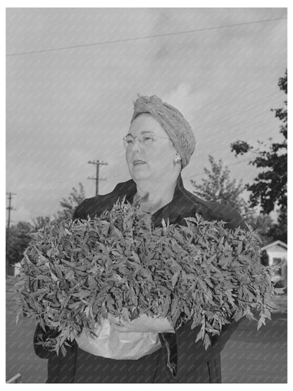 Housewife in Turlock CA with Tomato Plants May 1942
