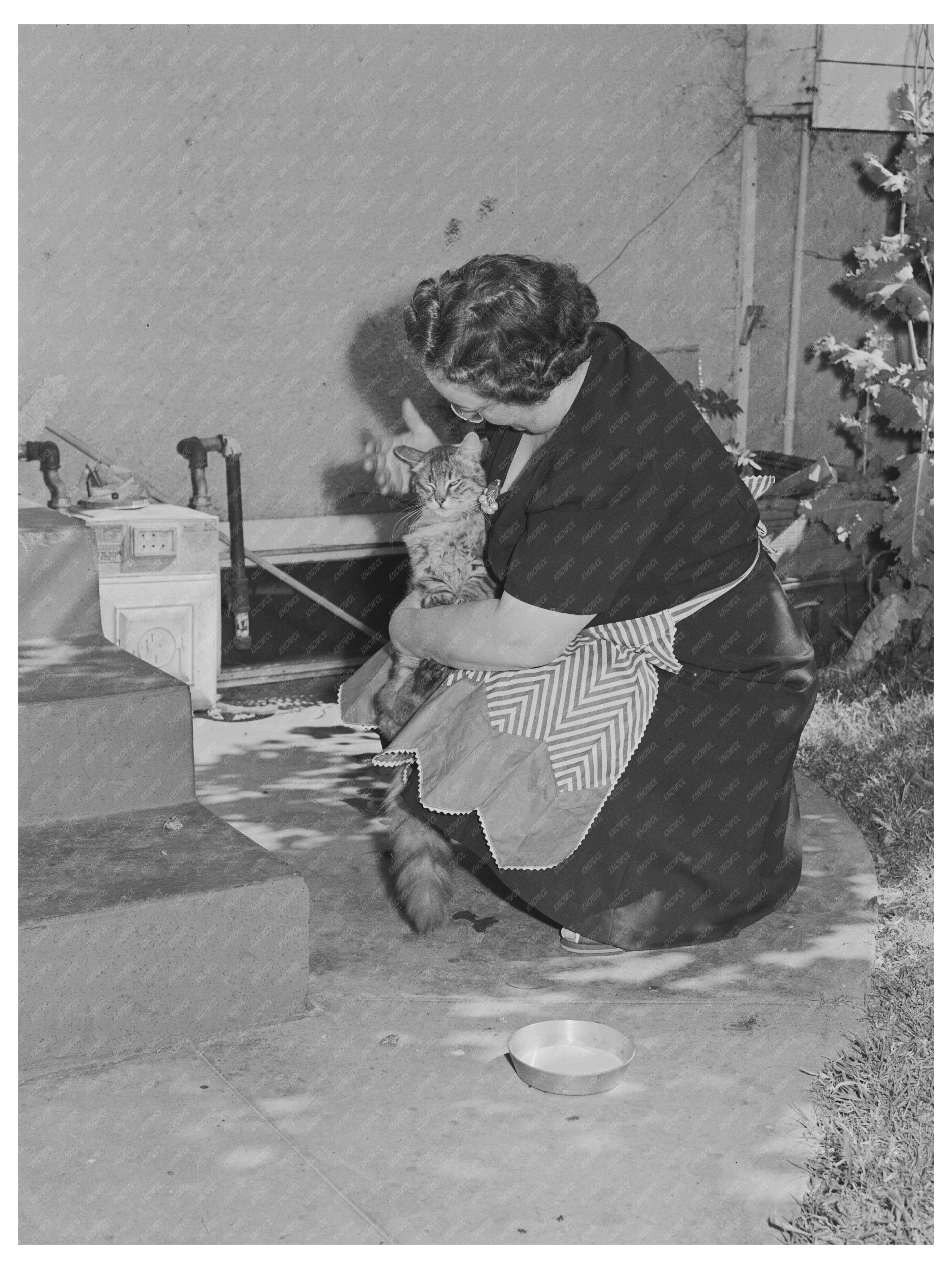 Housewife with Cat in Turlock California May 1942