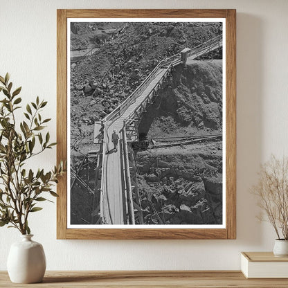 Workman on Catwalk at Shasta Dam June 1942