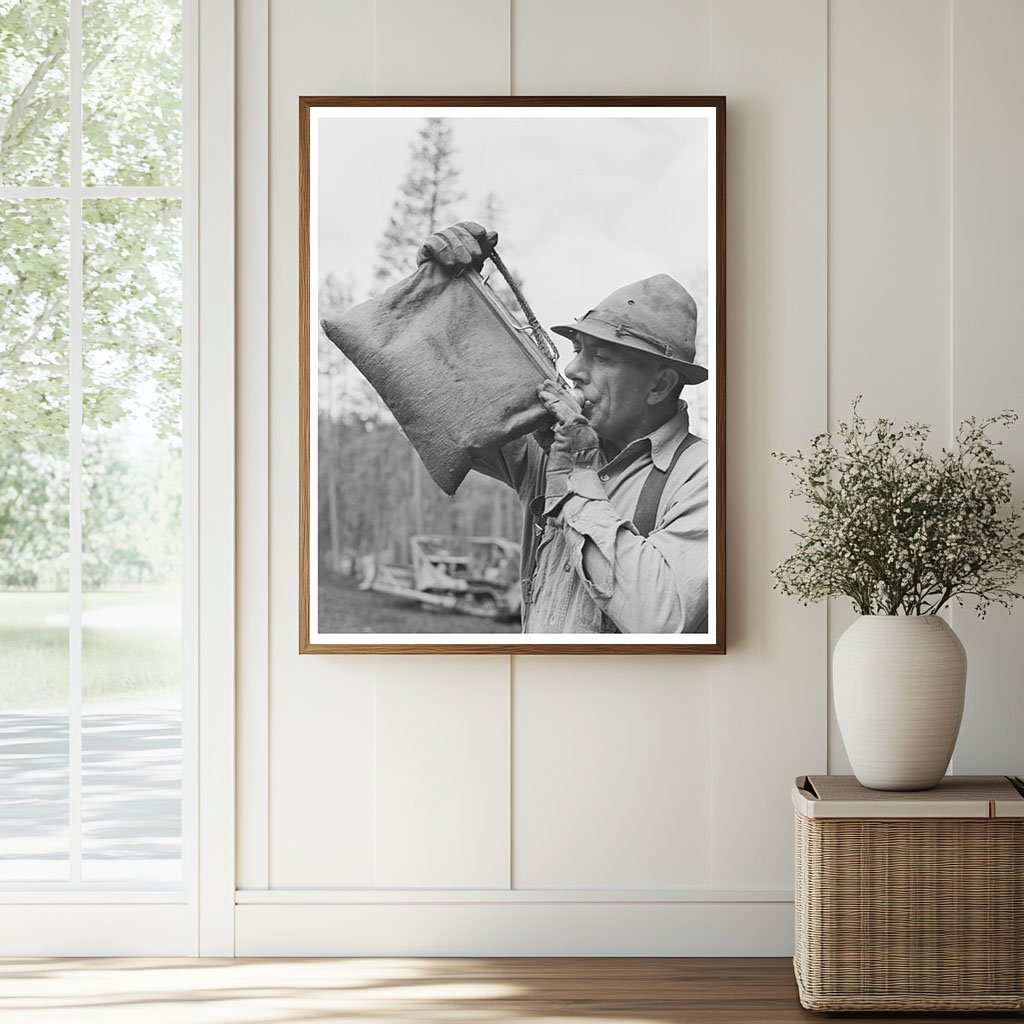 Lumberjack Drinking from Water Bag in Oregon 1942