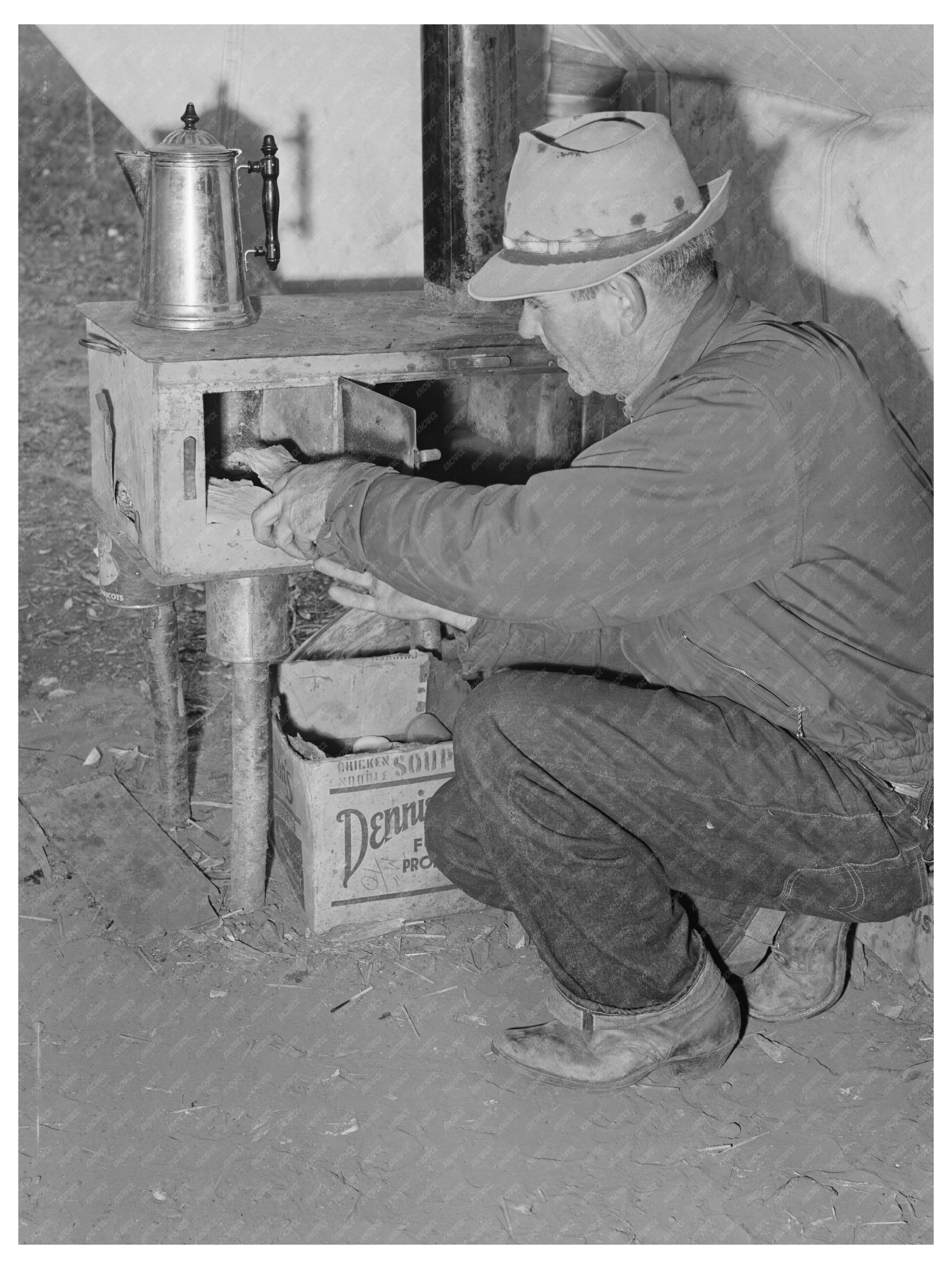 Sheepherder Prepares Fire for Dinner Montana August 1942