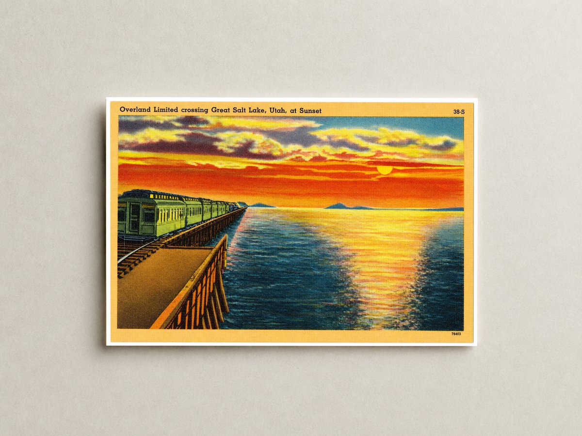 Great Salt Lake, UT: Overland Limited crossing Great Salt Lake, Utah, at sunset